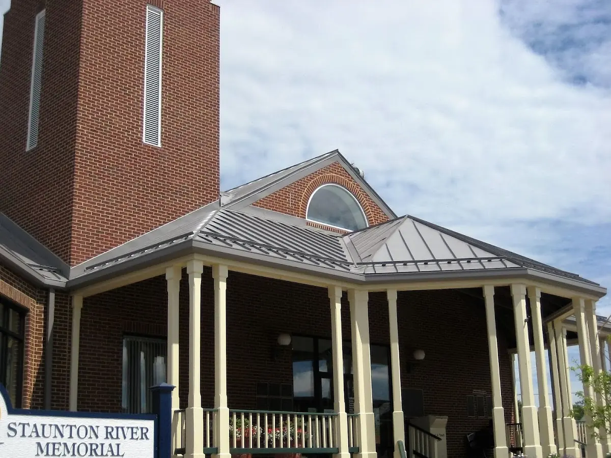 Skilled roofing craftsmen working on a residential roof in Cedarhaven